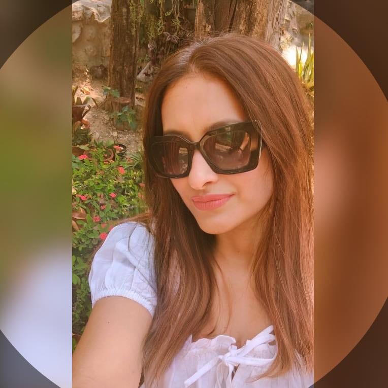 A journey from banking to building a fashion brand: Girl wearing white smocked dress